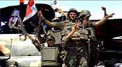 Syrie: l’opposition repousse sa décision de participer à Genève-2, l’armée progresse