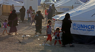 Déguisé en femme, un kamikaze fait 14 morts dans un camp de réfugiés en Irak

