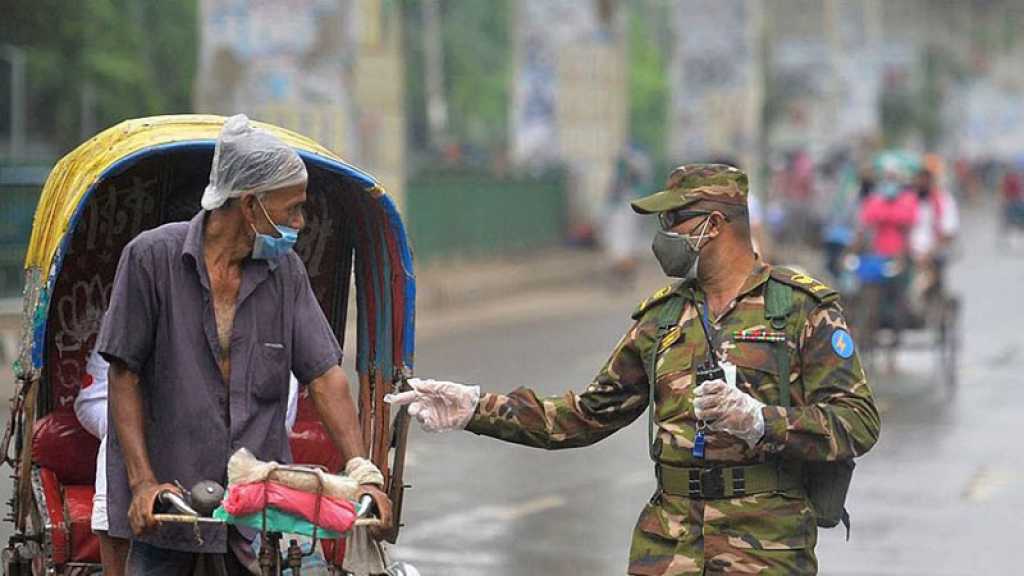 Virus: les cas recommencent à augmenter en Europe, confinement strict sous surveillance militaire au Bangladesh